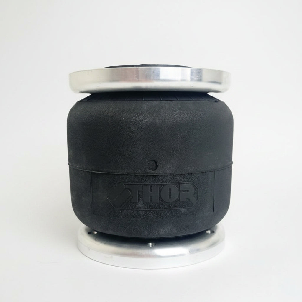 Tall sided single air spring for airbag suspension kits with limited available space.