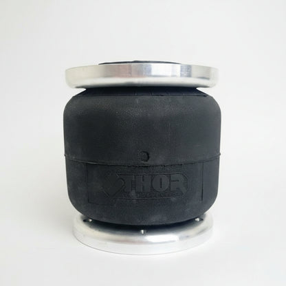 Tall sided single air spring for airbag suspension kits with limited available space.